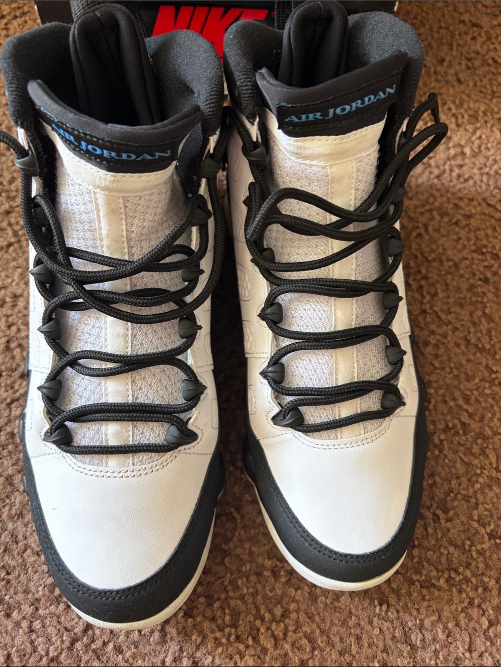 Jordan Men’s High-Top Sneakers in White, Black and Blue Accents